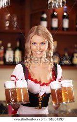 stock-photo-a-pretty-waitress-with-beers-at-the-bar-61854190.jpg