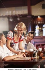 stock-photo-young-waitress-brings-the-beer-bar-visitors-63763513.jpg