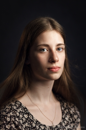 The portrait of the young cute girl